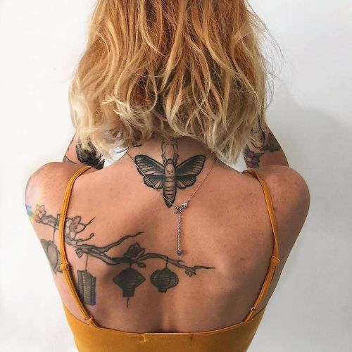 tatouage femme dos savannimalz⁠⁠
